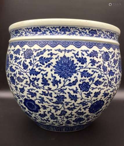 A LARGE BLUE AND WHITE JAR