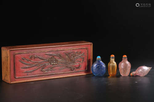 A Set of Four Chinese Peking Glasses Snuff Bottles