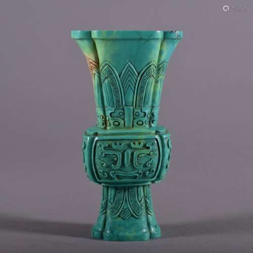A CARVED TURQUOISE VASE. Qing Dynasty