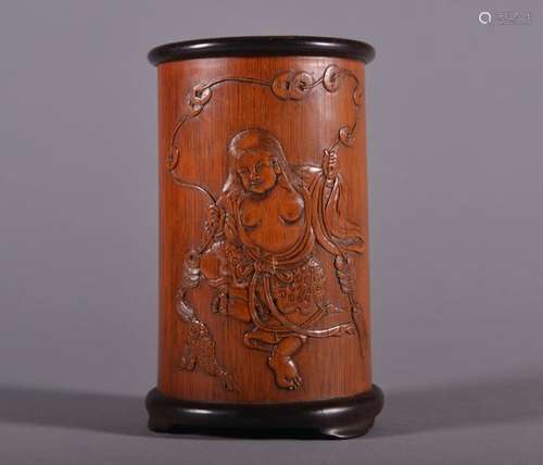 A CARVED BAMBOO BRUSHPOT. Qing Dynasty