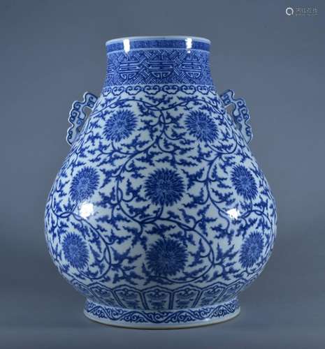 A BLUE AND WHITE 'INTERLOCKING LOTUS' VASE. Period of QianLong.