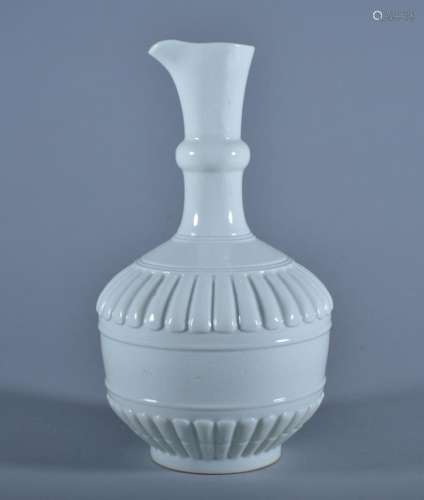 A CARVED WHITE-GLAZED EWER. Period of QianLong.