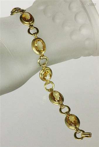 A BRACELET Gilt silver with citrines. Gross