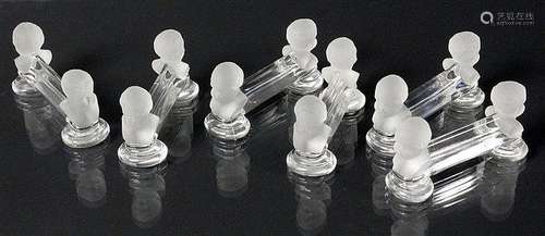 A SET OF 6 KNIFE RESTS Colourless and matted