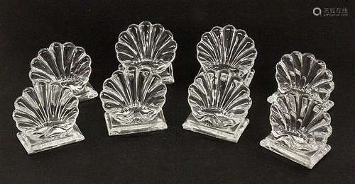 A SET OF 8 BACCARAT PLACE CARD HOLDERS Crystal