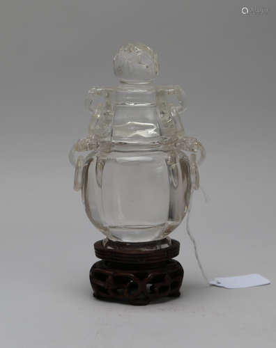 Qing dynasty crystal bottle with wooden pallet