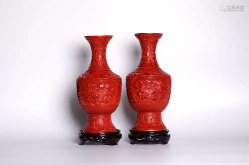 A pair of chinese 19 century lacquer red bottle