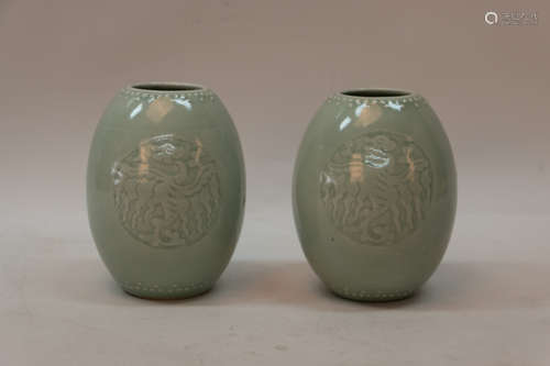 A pair of chinese green glaze porcelain jar