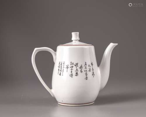 A Chinese famille rose 'bird and flower' teapot and cover