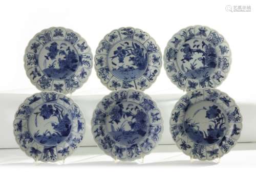 A set of six Chinese blue and white moulded twin geese dishes