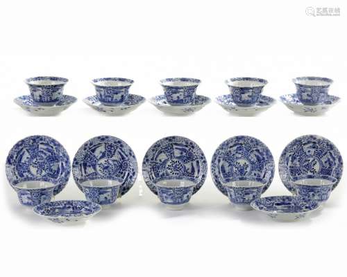 Ten sets of Chinese blue and white foliate rimmed cups and saucers