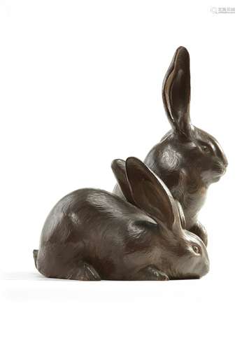 A Japanese wooden carving of two rabbits