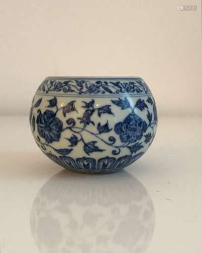 A small blue and white pot