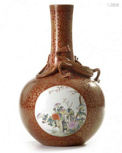 A Chinese iron-red-ground gilt-decorated famille rose bottle vase