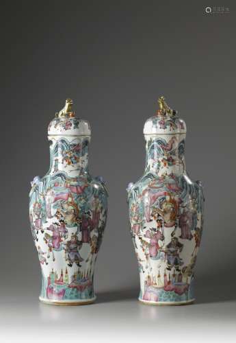 A pair of large Chinese famille rose baluster vases and covers