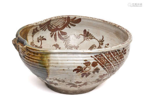 A large and slightly oval Oribe-ware water-vessel