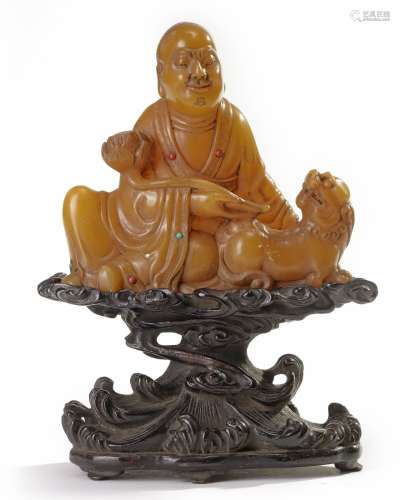 A Chinese soapstone carving of a Luohan