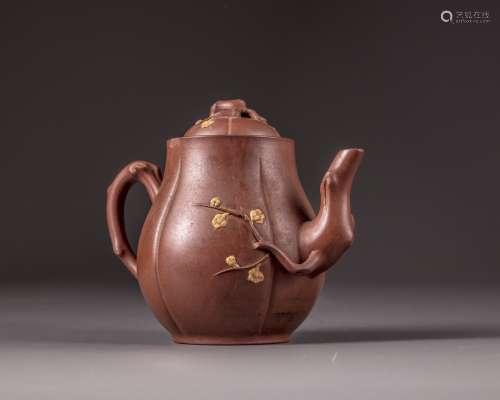 A Chinese yixing melon-form prunus teapot and cover