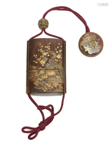 A five part inr?-case decorated with a floral design and (reverse) bamboo