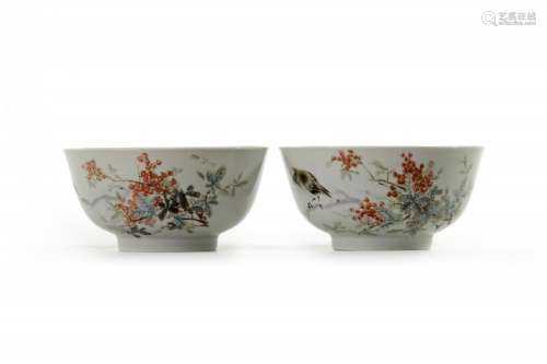 A pair of Chinese famille rose 'bird and berry' bowls
