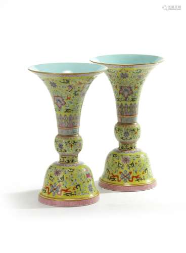 A pair of Chinese yellow-ground 'bajixiang' gu vases