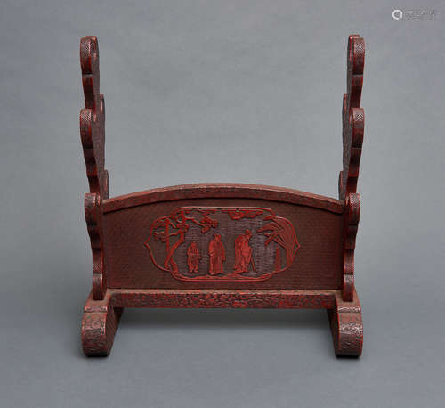 A red lacquered finely carved Kamakurabori sword stand