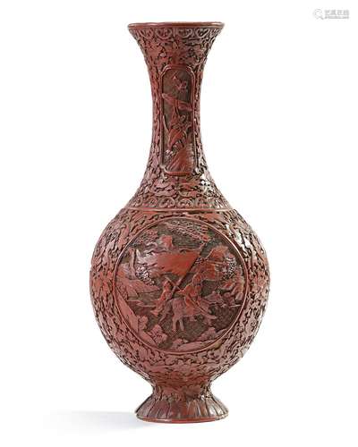 A Chinese carved cinnabar lacquer slender vase