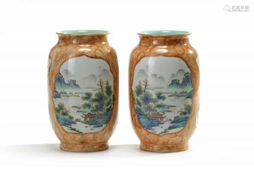 A pair of Chinese imitation puddingstone-ground famille rose vases