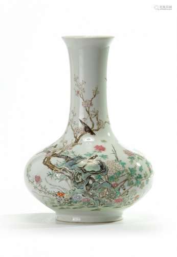 A Chinese famille rose 'magpie and prunus' bottle vase