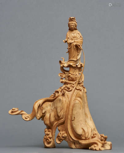 A Chinese rootwood carving of Guanyin