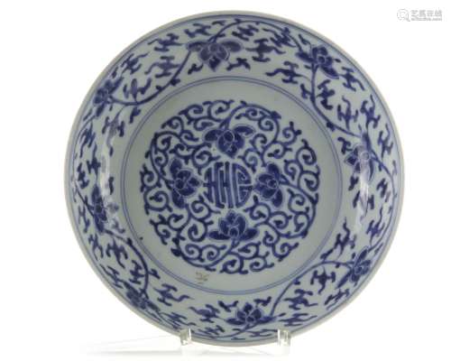 A Chinese blue and white scrolling lotus dish