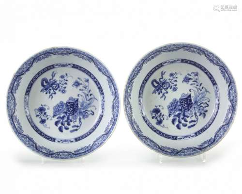 A pair of Chinese blue and white 'precious objects' bowls