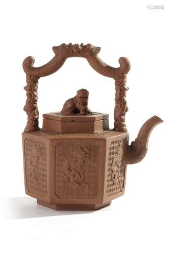 A Chinese yixing hexagonal 'dragon' teapot and cover