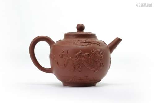 A Chinese yixing 'dragon and phoenix' teapot and cover