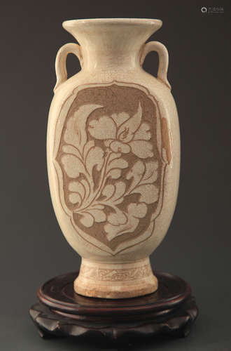 A CI ZHOU YAO FLOWER CARVING PORCELAIN BOTTLE