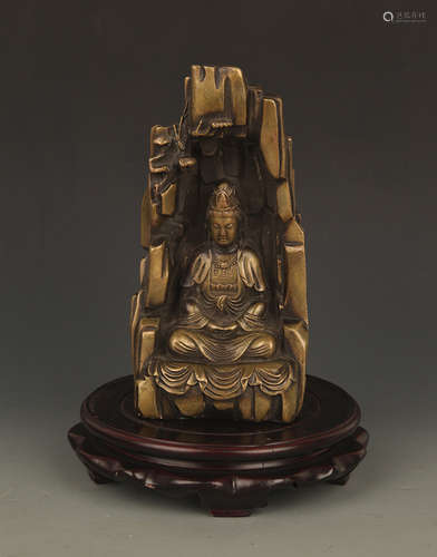 A FINELY CARVED BRONZE GUAN YIN