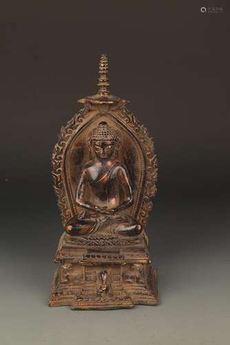 A BRONZE TATHAGATA BUDDHA FIGURE WITH HALO