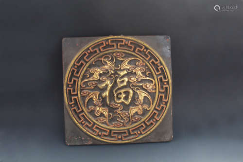 A FINE GILT LACQUERED PLAQUE CARVING WITH 