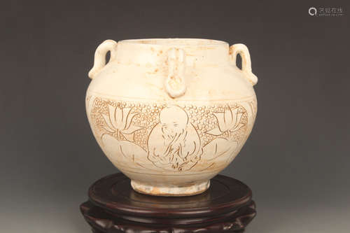 A LOTUS CARVING JI ZHOU YAO PORCELAIN JAR