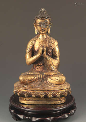 A FINELY CARVED TIBETAN BUDDHA 