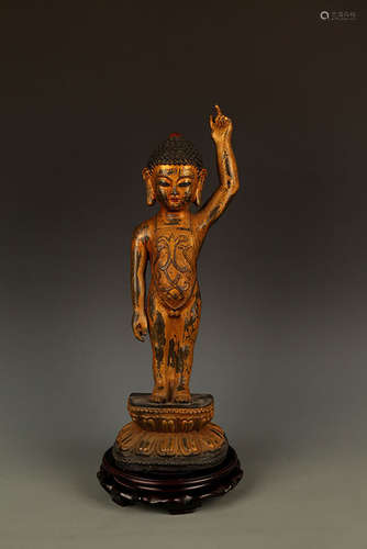 A TALL BRONZE BUDDHA FIGURE