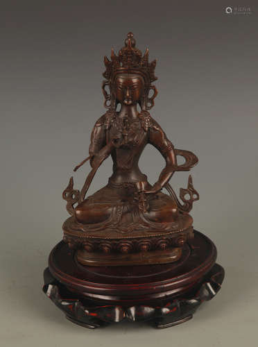 A FINELY CARVED TIBETAN BUDDHA