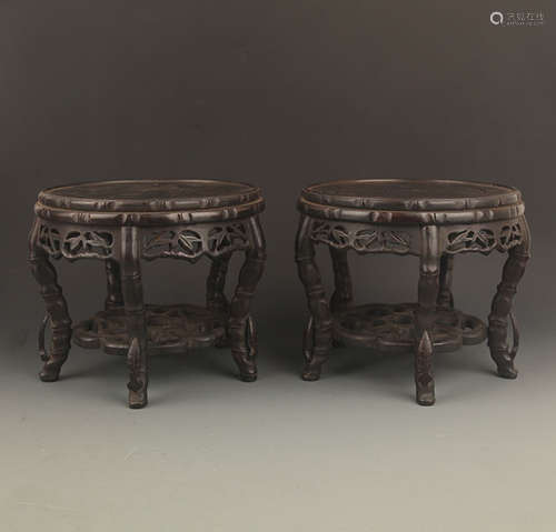 PAIR OF TALL AND DETAILED CARVED STAND