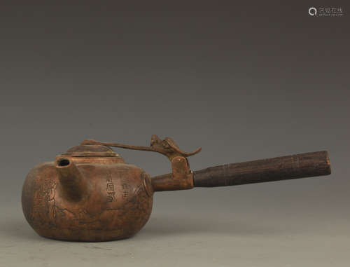 A FINE LONG HANDLE AND CARVED WATER EWER