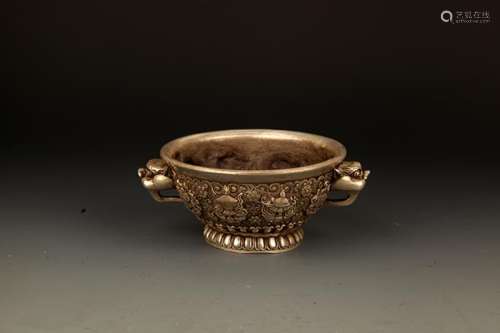 A FINELY CARVED ANIMAL EAR HANDLE CENSER