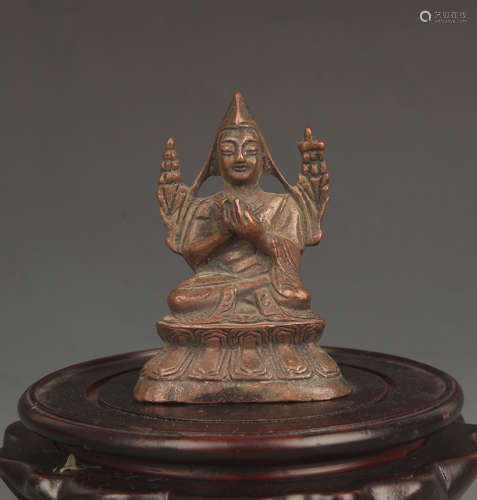 A FINELY CARVED BRONZE BUDDHA