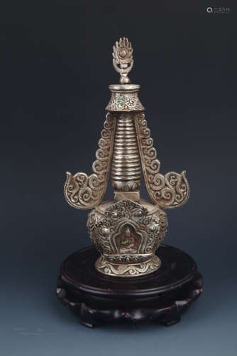 A TALL SILVER PLATED BUDDHA TOWER