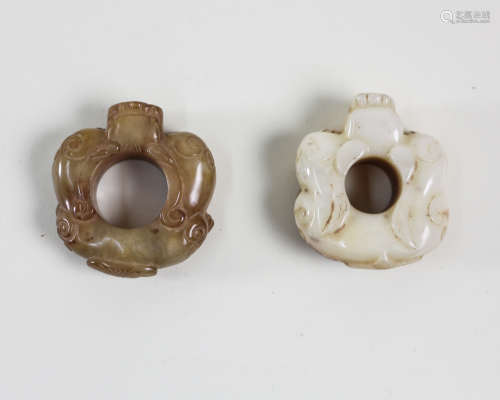 TWO JADE PENDENTS