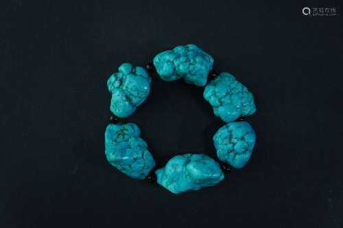 A TURQUOISE BRACELET