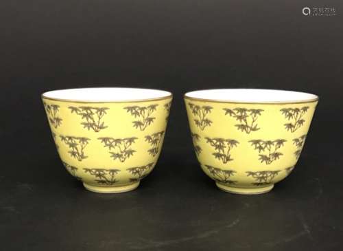 Tongzhi Mark, A Pair of Yellow Glazed Gilt Cups
